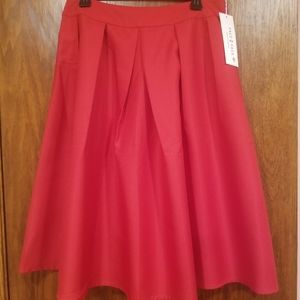 Pleated skirt with pockets